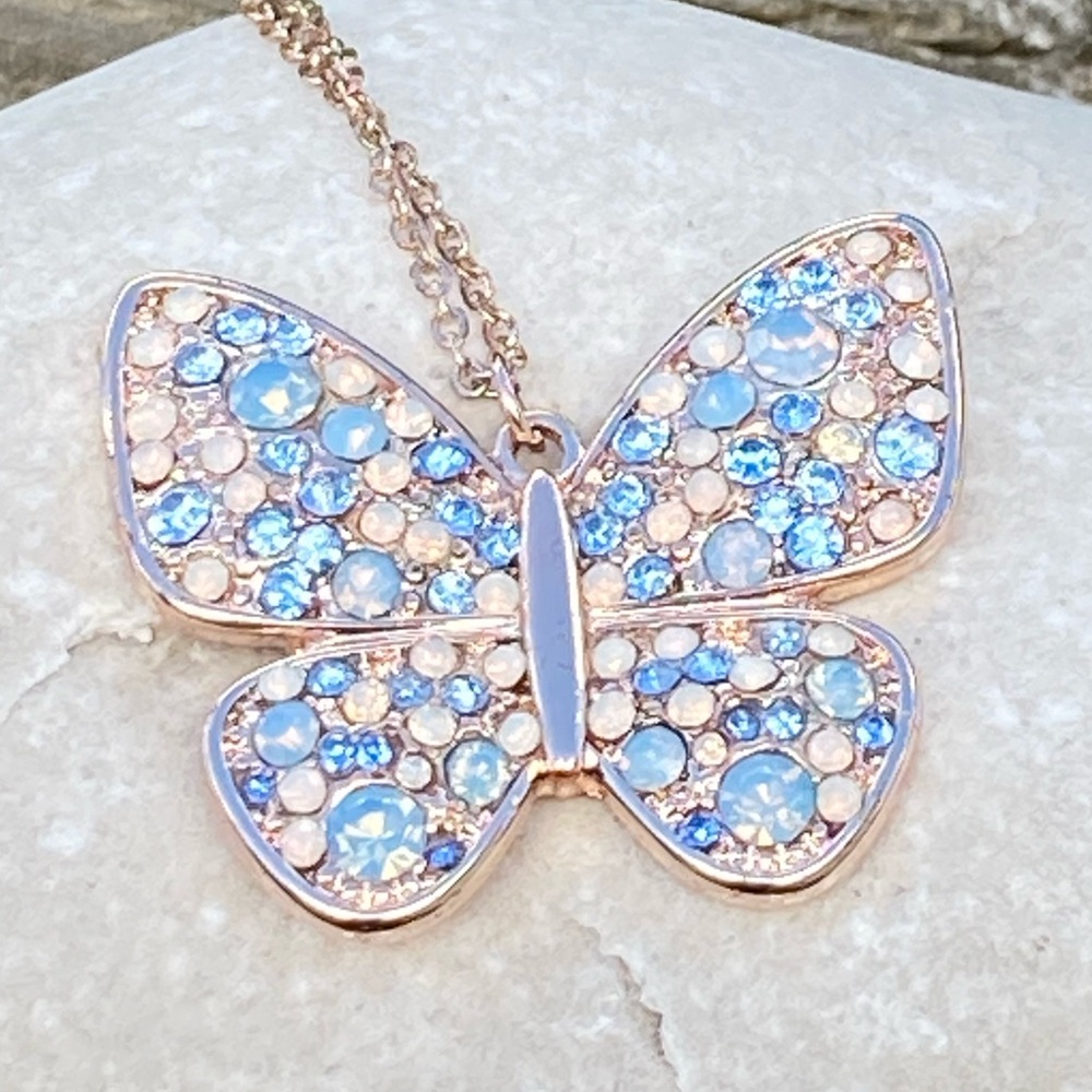 Lauren Conrad Blue Crystal Butterfly necklace rose gold
Plated 30” chain